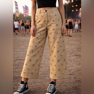 Lazy Oaf Pants Size 12 Smiley Sad Face Print Tan Wide Leg Cropped Quirky Indie